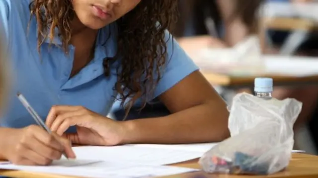 girl sitting academic exam