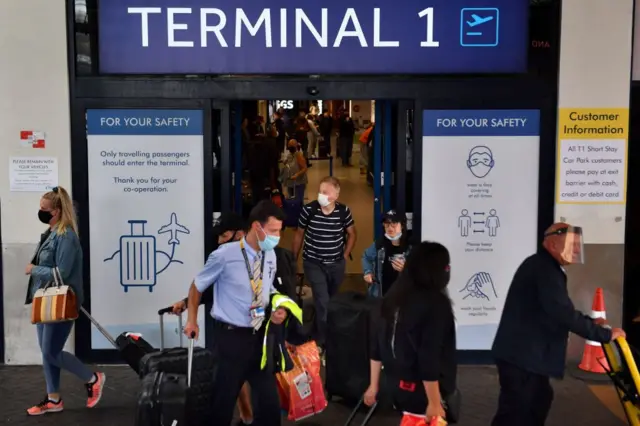 Travellers at Manchester Airport