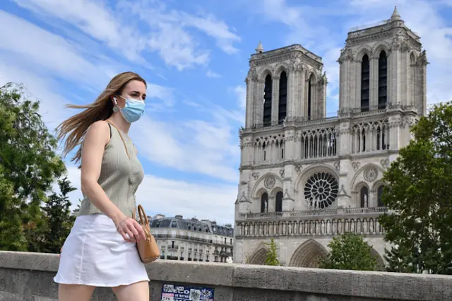 A woman wears a mask in Paris, France on August 13, 2020.