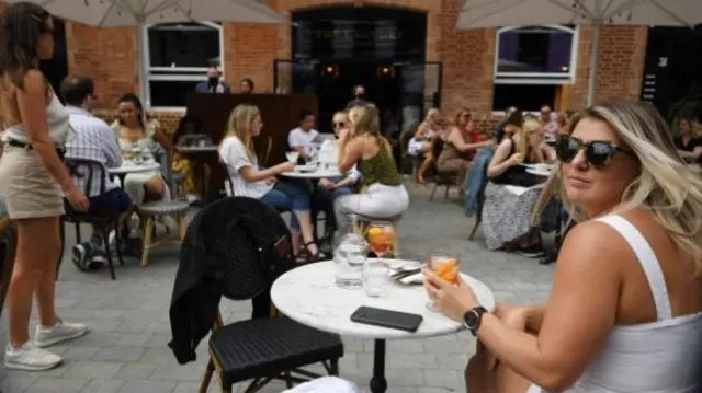 People at a bar in Brixton, south London