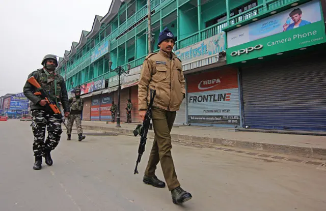 Indian paramilitary soldiers partolling during a shutdown in Srinagar