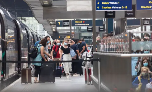 People arrive in London from France