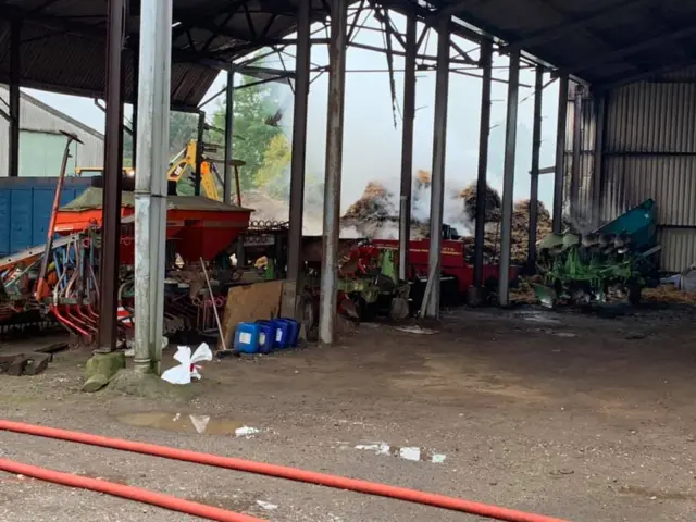 Barn fire aftermath