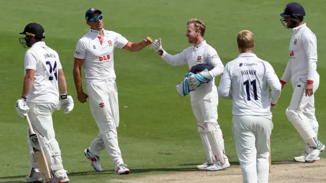 Sir Alastair Cook takes a catch