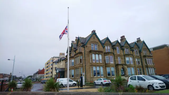 The flag at half mast