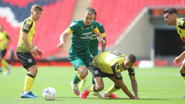 Callum Roberts runs with the ball