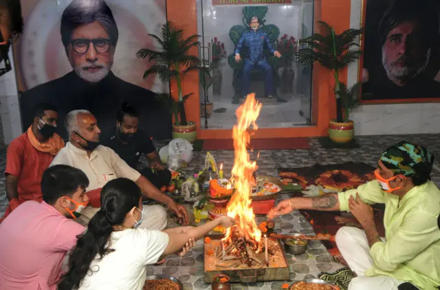 Fans of Bollywood actor Amitabh Bachchan offer a special prayer for his health in in Kolkata, eastern India.