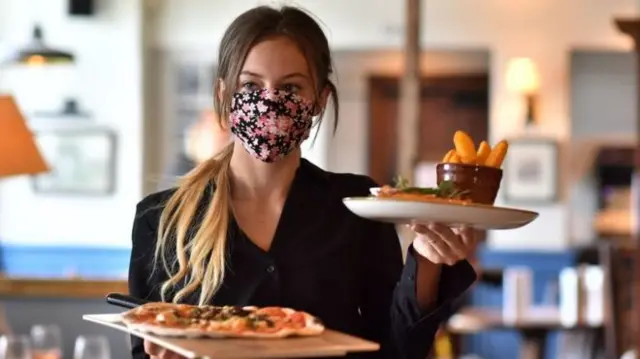 woman serving food