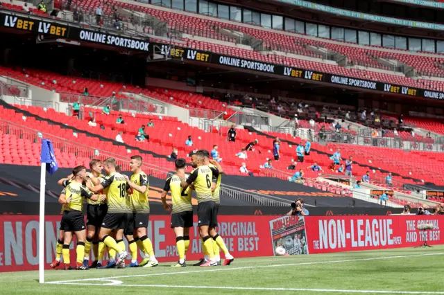 Harrogate celebrate their opening goal