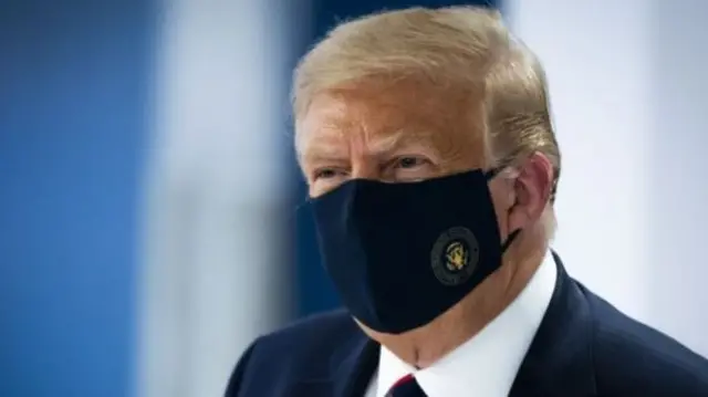 Donald Trump wearing a face mask