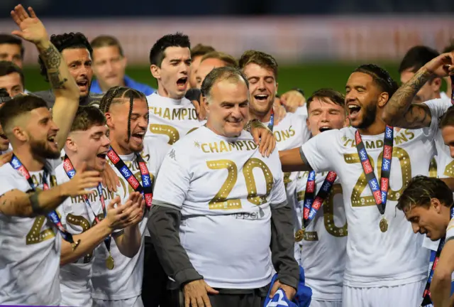 Marcelo Bielsa celebrating with the Leeds squad