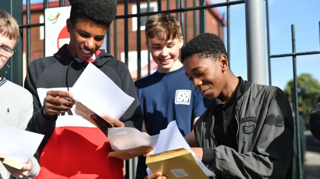 Students at Bristnall Hall Academy in Oldbury, as they receive their GCSE results.