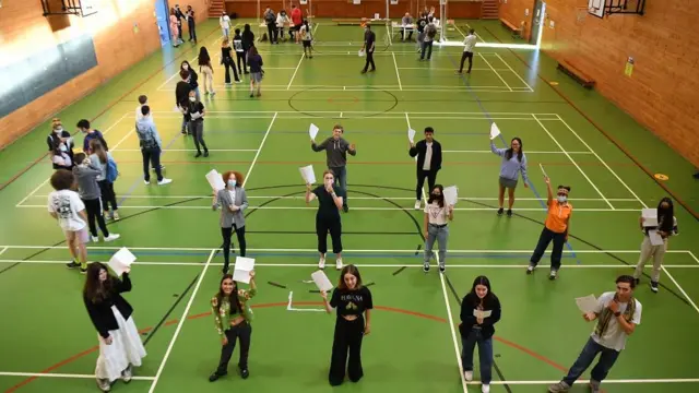 Secondary school students with their GCSE results at Kingsdale Foundation school in south London, Britain, 20 August 2020.