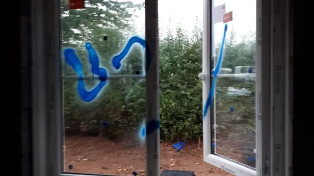 Graffiti sprayed on window