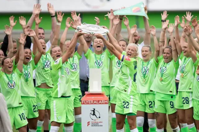 Wolfsburg lift the Frauen Bundesliga trophy after beating Bayer Leverkusen in March