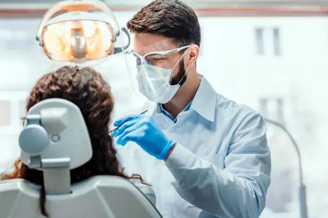 Dentist in PPE