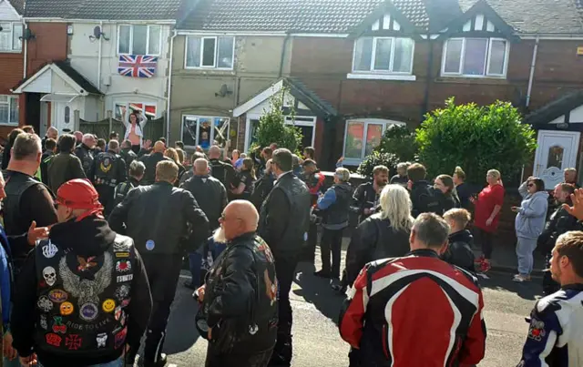 Bikers sing to boy