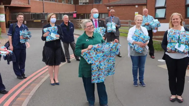 Staff at Lincoln hospital with rainbow scrubs