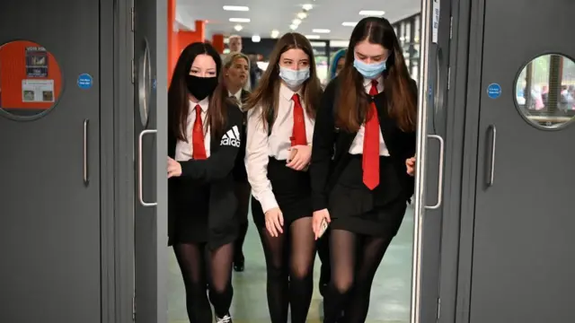 School girls in face coverings