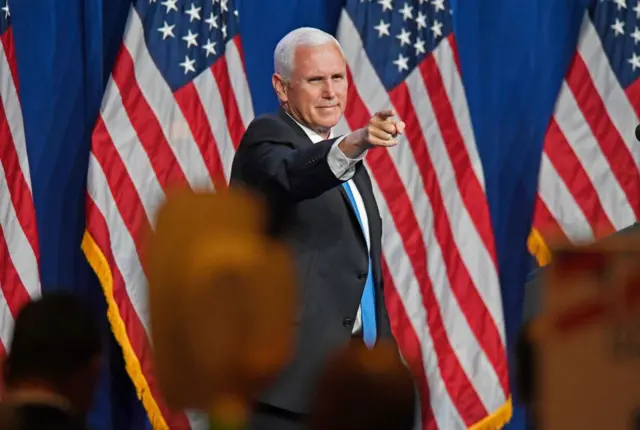 Vice-President Mike Pence points to delegates on the first day of the Republican National Convention at the Charlotte Convention Center on August 24, 2020 in Charlotte, North Carolina.