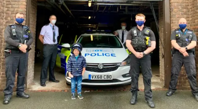 Josh with police officers