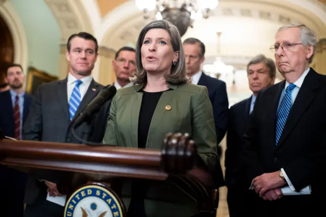 Ernst speaks alongside Republican senators on Capitol Hill in March