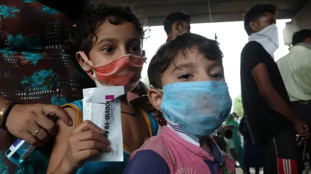 Children in Jammu waiting for Covid tests