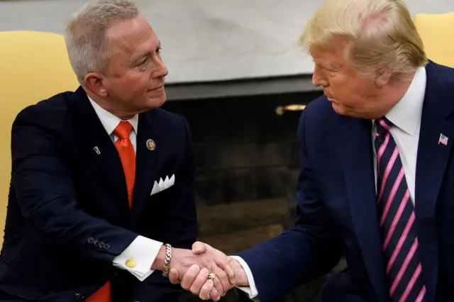 Van Drew and Trump shake hands