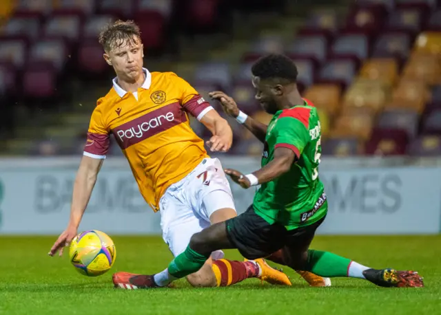 Motherwell's Mark O'Hara and Gael Bigirimana of Glentoran