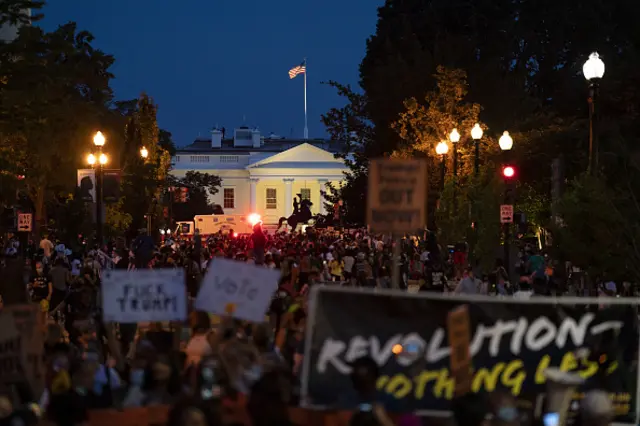 Protesters march near the White House at a demonstration during the Republican National Convention in Washington, D.C., U.S., on Thursday, Aug. 27, 2020.