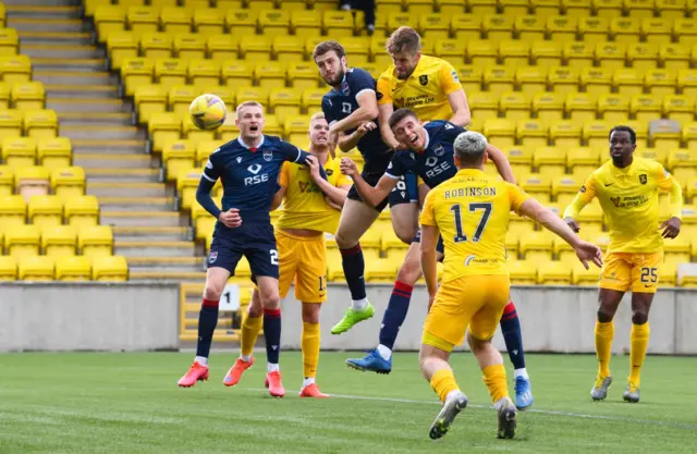 Jon Guthrie heads into the net for Livingston