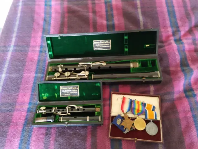 Stolen antique flute and medals