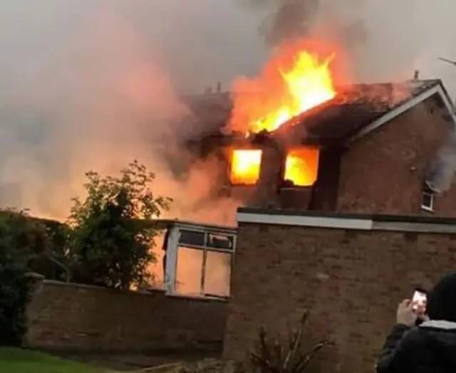 House hit by lightning in flames