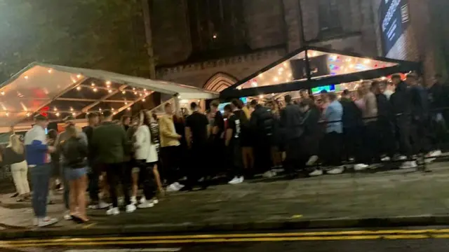 People gather outside the Soul bar in Aberdeen