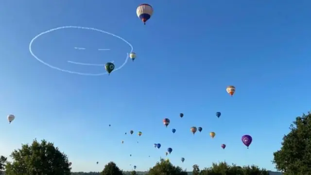 A smiling face created by aircraft pilot Richard Goodwin greeted the balloons