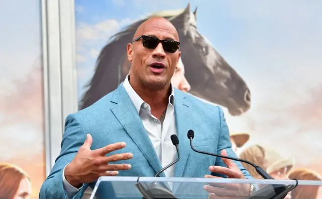 Actor Dwayne Johnson speaks at Kevin Hart's Hand and Footprints ceremony in Hollywood, California on December 10, 2019