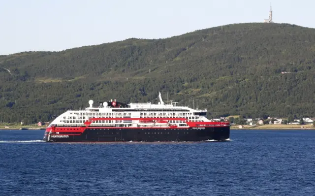 The Hurtigruten ship Roald Amundsen leaves the harbor in Tromso, Norway