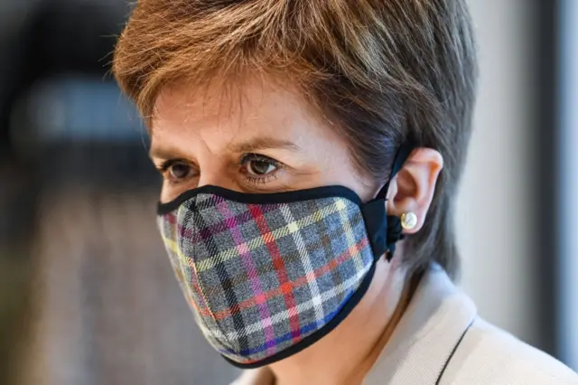 Nicola Sturgeon wearing tartan face mask