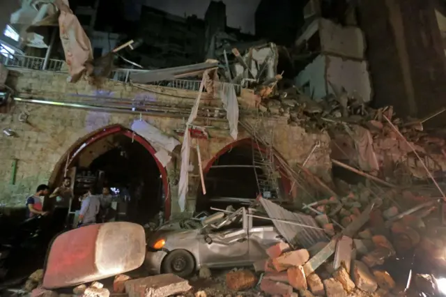 This picture taken on August 4, 2020 shows a general view of destruction along a street in the centre of Lebanon's capital Beirut,