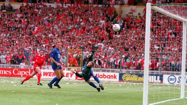 Craig Maskell scores for Swindon against Leicester, curling the ball off the post