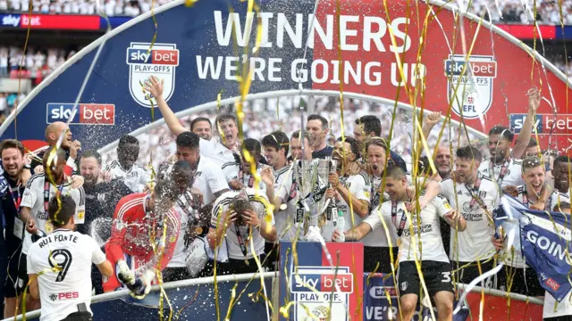 Fulham players celebrate their 2018 final win