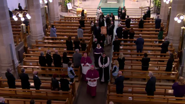 Coffin leaving