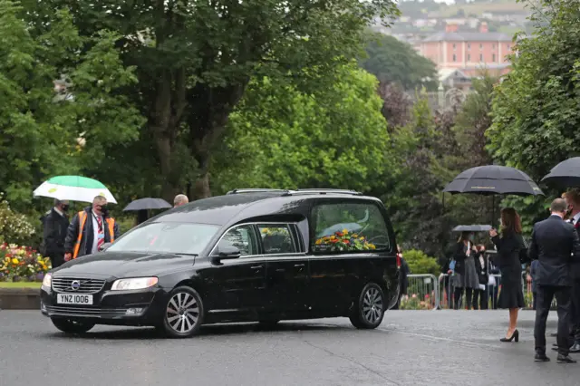 John Hume's hearse arrives