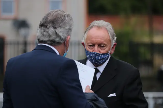SDLP politician Alban Maginness talks to musician Philip Coulter (right) outside St Eugene"s Cathedral