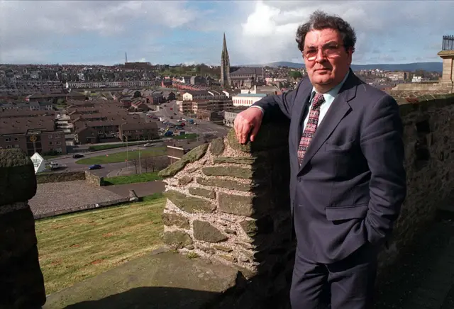 John Hume pictured on Derry's walls