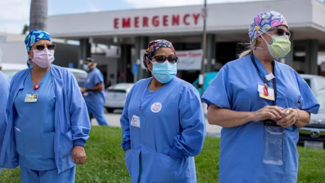 Healthcare workers hold a rally outside their hospital for safer working conditions during the outbreak of the coronavirus disease in Fountain Valley, California, 6 August, 2020.