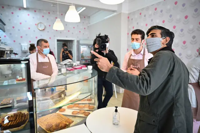 Chancellor Rishi Sunak in a cafe on the Isle of Bute, Scotland