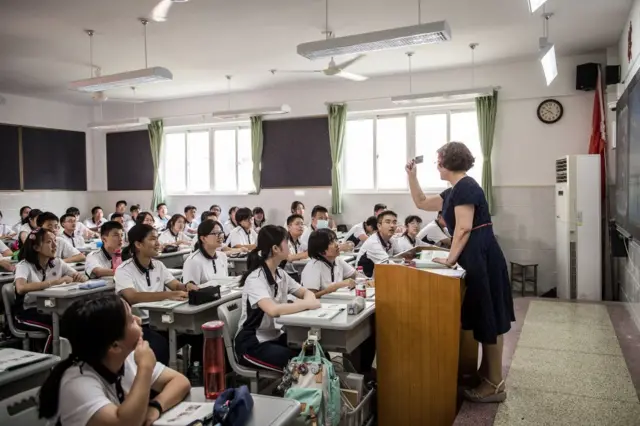 Students in class at Wuhan High School on the first day of the new semester in Wuhan in China's central Hubei province on 1 September 2020