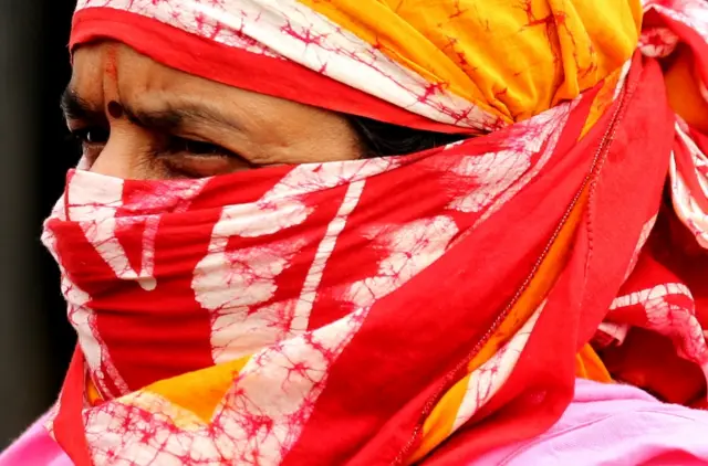 A woman wears a face covering in Bangalore, India. File photo