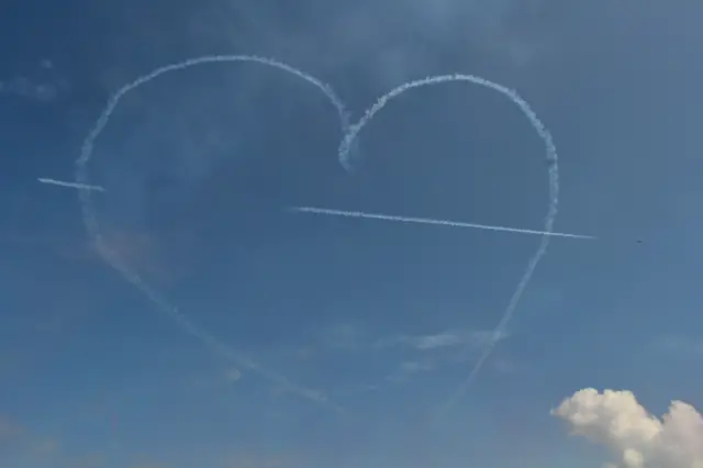 Red Arrows with an arrow through a heart